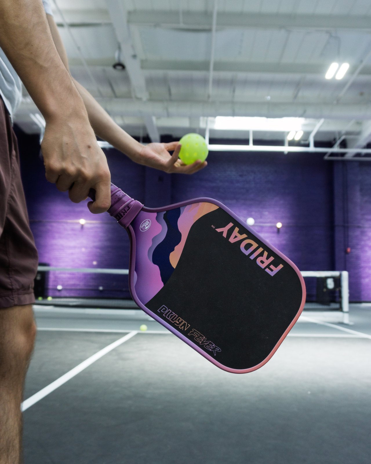 FRIDAY × PKLYN Fever collaboration paddle on the courts